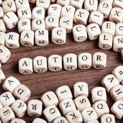 Letter dice spelling out author